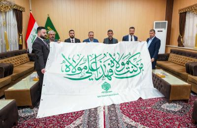 وفد العتبة العلويّة المقدّسة يسلّم راية الغدير الأغرّ إلى العتبة العسكريّة المقدّسة 