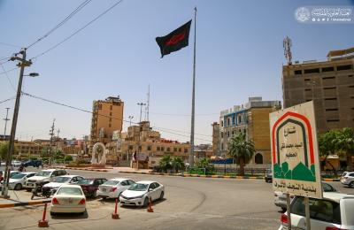 العتبة العلوية ترفع راية (فزت ورب الكعبة)  بذكرى استشهاد أمير المؤمنين(عليه السلام) في أماكن مختلفة من النجف الأشرف 